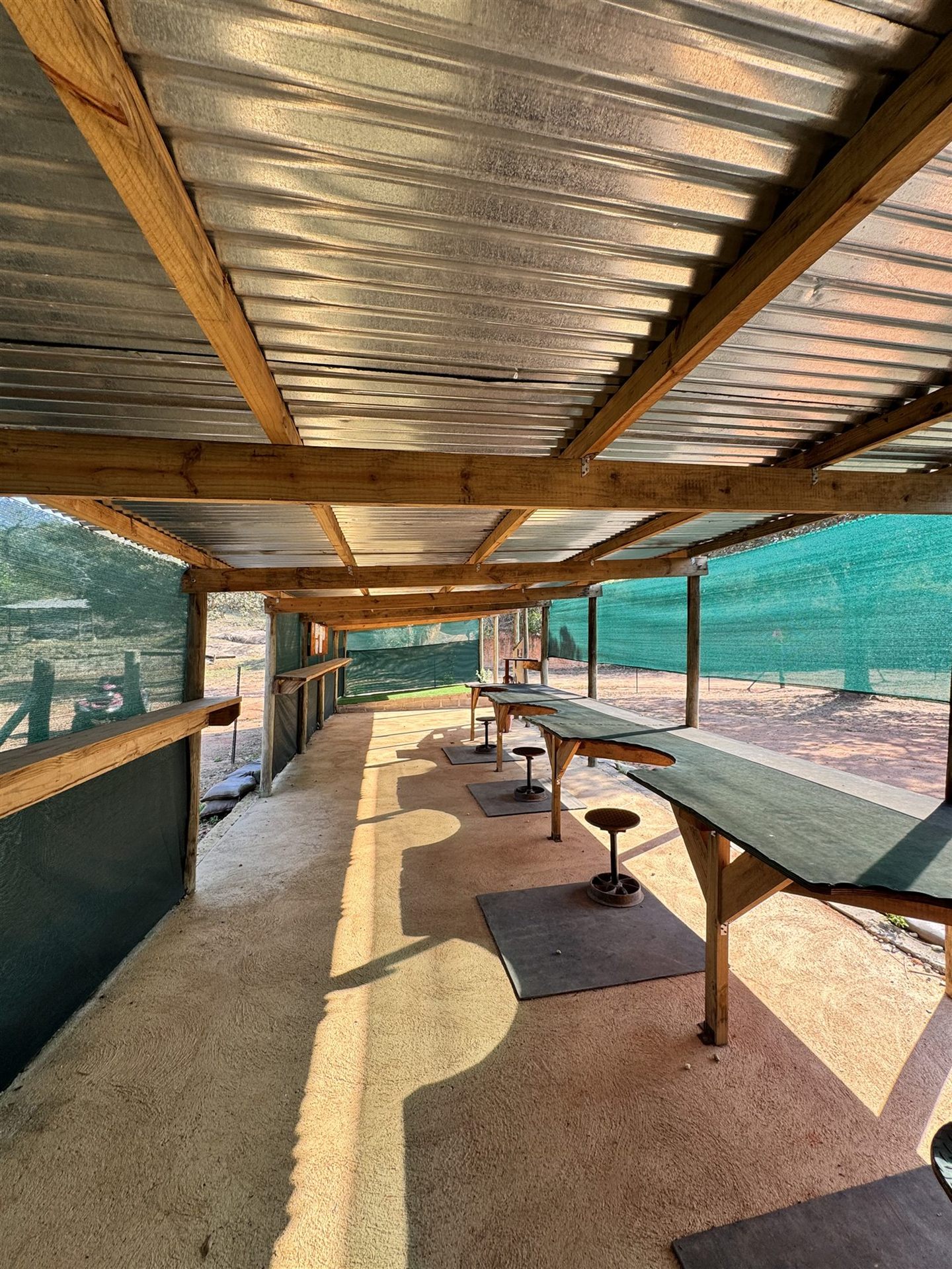 Covered shooting bays designed for an orderly firing line
